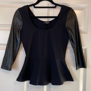 BEBE Peplum leather accent top